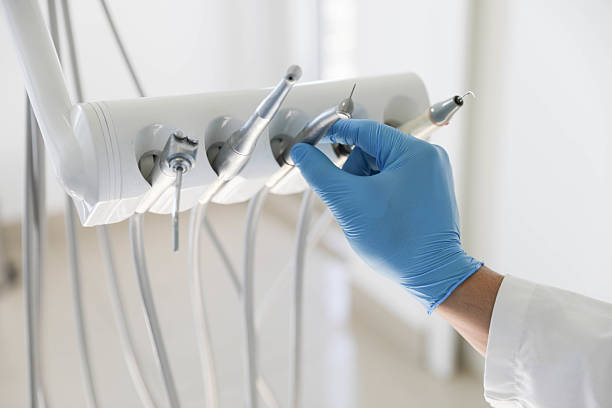Professional Tooth Extraction technician working in Chepachet, RI